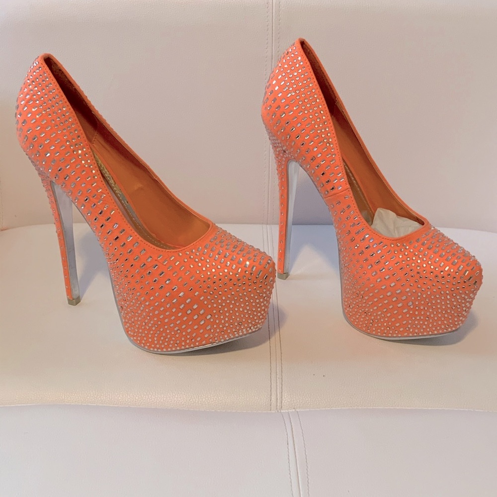 Coral colored pumps